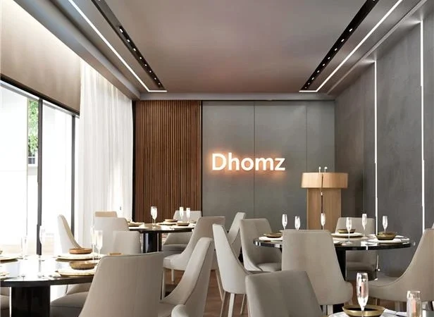Perinthalmanna villas with premium clubhouse dining area, modern interiors, and elegant seating