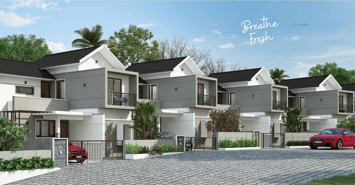 Villa projects in Malappuram with modern row villas, gated entrance, landscaped surroundings, and spacious layout